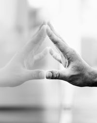 Cropped hand of woman holding hands