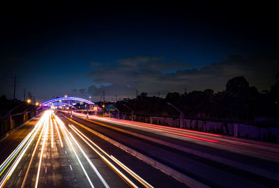 Light trails on road at night