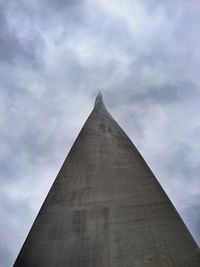 Low angle view of tower against cloudy sky