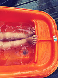 Close-up of hands in water