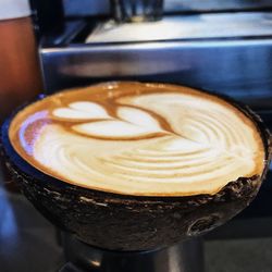 Close-up of cappuccino on table