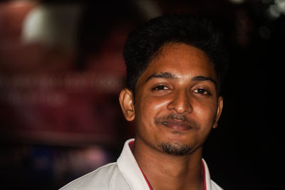 Close-up portrait of mid adult man