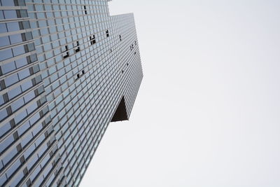 Low angle view of modern buildings against clear sky