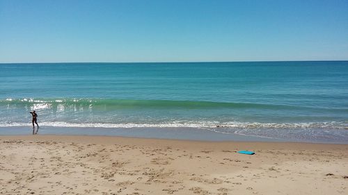 Scenic view of sea against clear sky