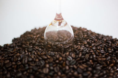 Close-up of coffee beans in glass