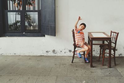 Portrait of a boy playing on the floor