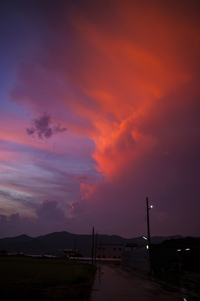 SCENIC VIEW OF DRAMATIC SKY OVER SILHOUETTE LANDSCAPE