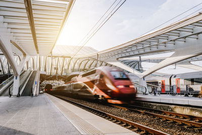 Train on railroad station platform against sky