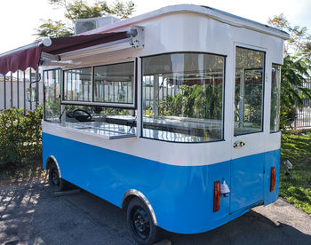 Vintage blue empty food truck in the street.