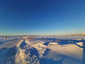 Fishing on the ice on the st-lawrence river in front of rimouski 