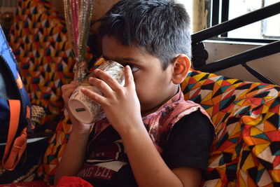 A boy drinking milk shake