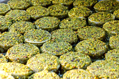 Traditional turkish desserts baklava and lokum in open buffet restaurant at hotel 