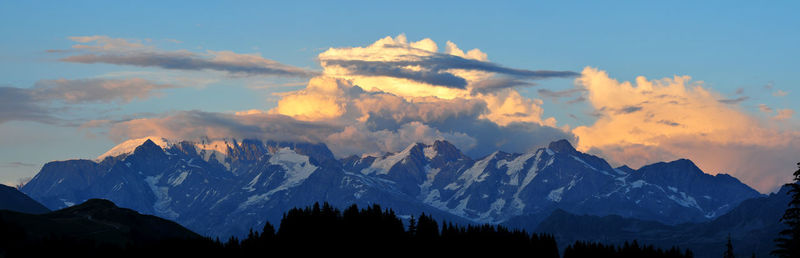 Panoramic view of mountains against sky during sunset