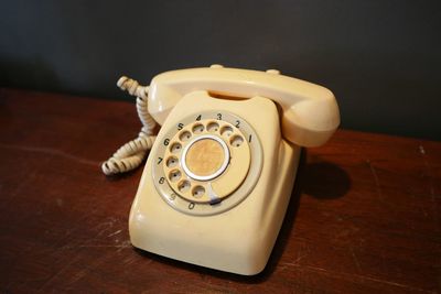High angle view of telephone on table