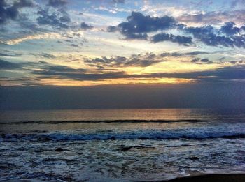 Scenic view of sea at sunset