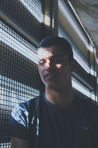 Portrait of young man looking away