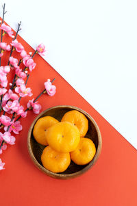 High angle view of orange fruits on table