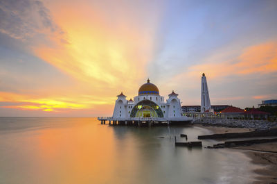 View of mosque at sunset