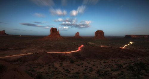 Panoramic view of landscape against sky at night