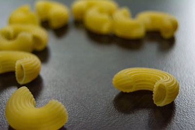 Close-up of yellow rose on table