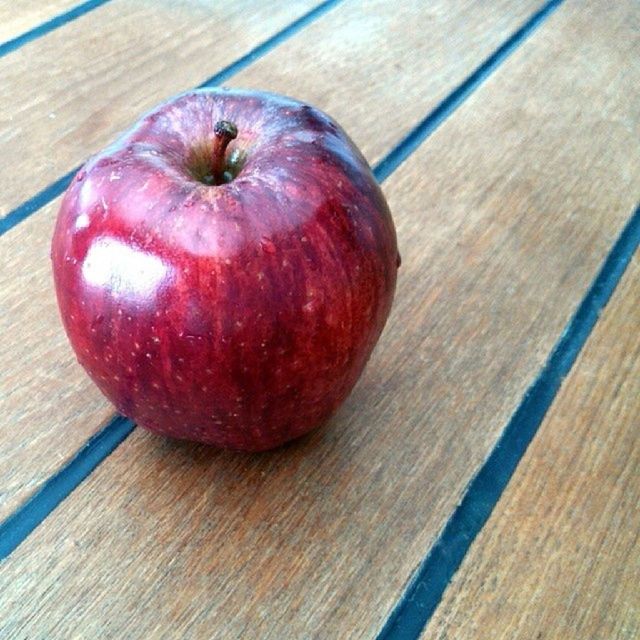 wood - material, wooden, table, food and drink, freshness, wood, healthy eating, indoors, food, still life, plank, fruit, close-up, high angle view, red, apple - fruit, apple, no people, single object, directly above