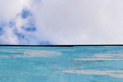 Scenic view of sea against blue sky