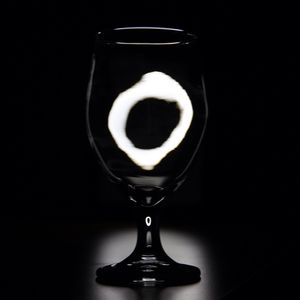 Close-up of drink over black background