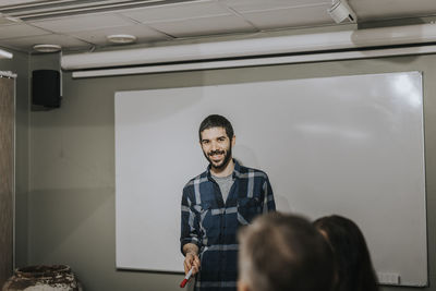 Smiling man during business meeting