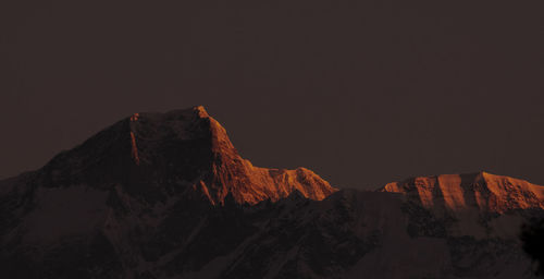 Rock formations on mountain against sky