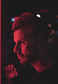 Portrait of young man looking away