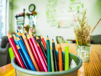 Close-up of colored pencils on table