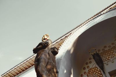 Low angle view of statue against clear sky