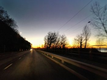 Empty road at sunset