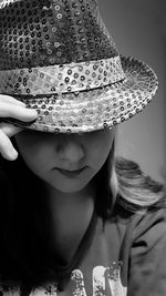 Close-up of girl wearing hat