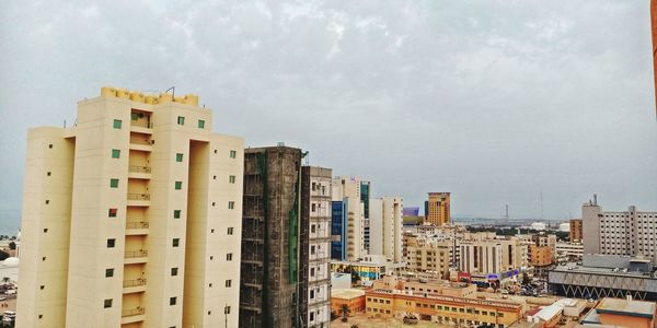 High angle view of buildings against sky