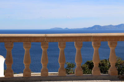 Panoramic shot of sea against blue sky