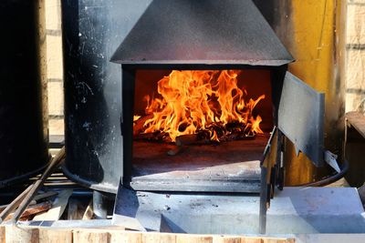 Close-up of fire in stove