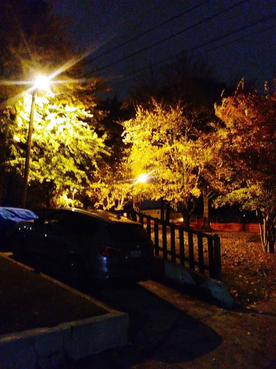 ILLUMINATED STREET AT NIGHT