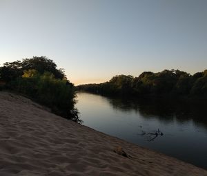 Scenic view of lake against clear sky