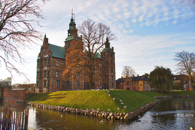 Buildings in city against sky