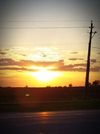 Scenic view of landscape at sunset