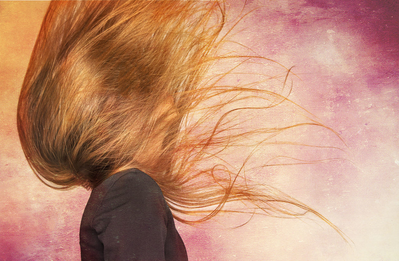 CLOSE-UP PORTRAIT OF A WOMAN WITH HAIR