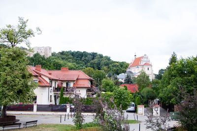 Houses and buildings against sky