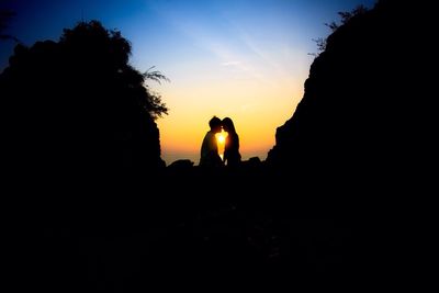 Silhouette of trees at sunset
