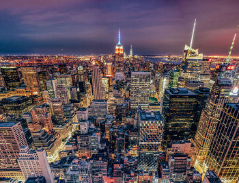 High angle view of illuminated buildings in city