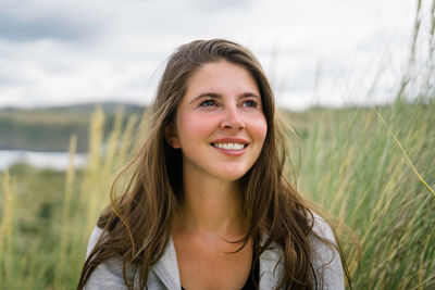 Portrait of smiling young woman