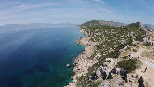 Aerial view of mountain by sea against sky at loutraki