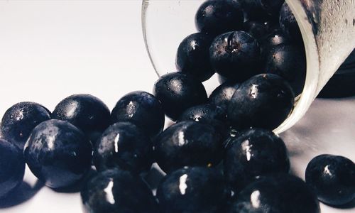 Close-up of black fruits on table