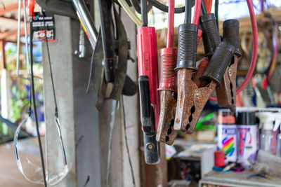 Close-up of padlocks hanging on metal