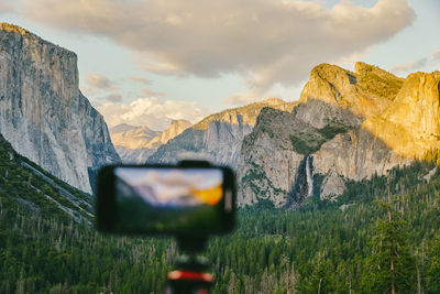 Phone taking picture of yosemite national park in northern california.